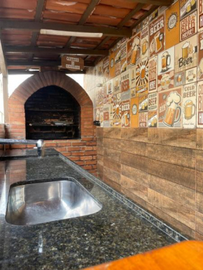 Apartamento Praia do Morro com Churrasqueira, Cozinha Gourmet e Wifi